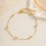 دستبند توپی مینیمال روکش طلا از برند ماریس